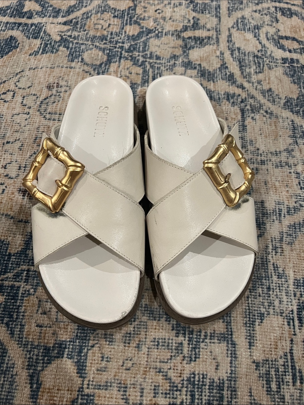 SCHUTZ Ivory Leather Crossband Slide Sandals with Gold Buckles